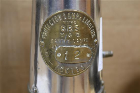 Two miners lamps and a bicycle lamp